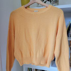 Orange knit light sweater